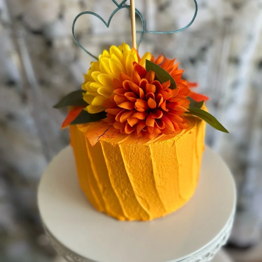 FALLING FOR YOU Vibrant Orange faux Cake with Floral Decoration.